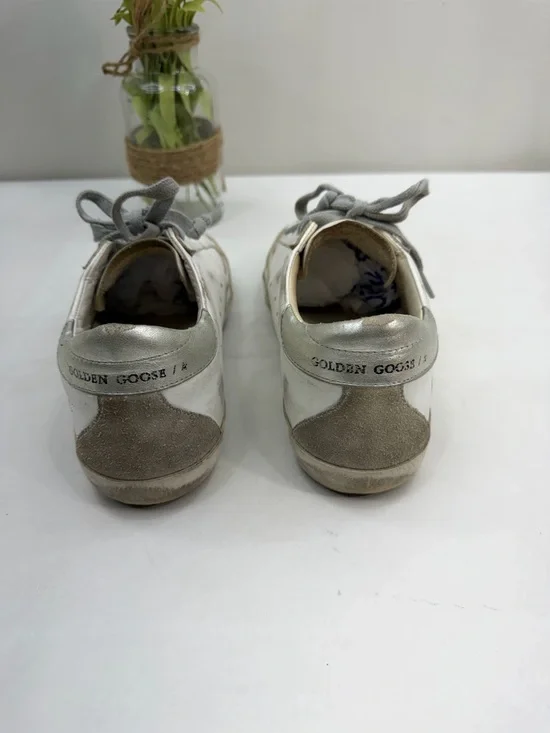 Golden Goose Deluxe Brand Super-Star sneakers in a white and silver colorway. - Picture 3 of 8